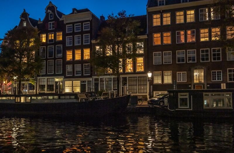 Amsterdam canal houses at dusk